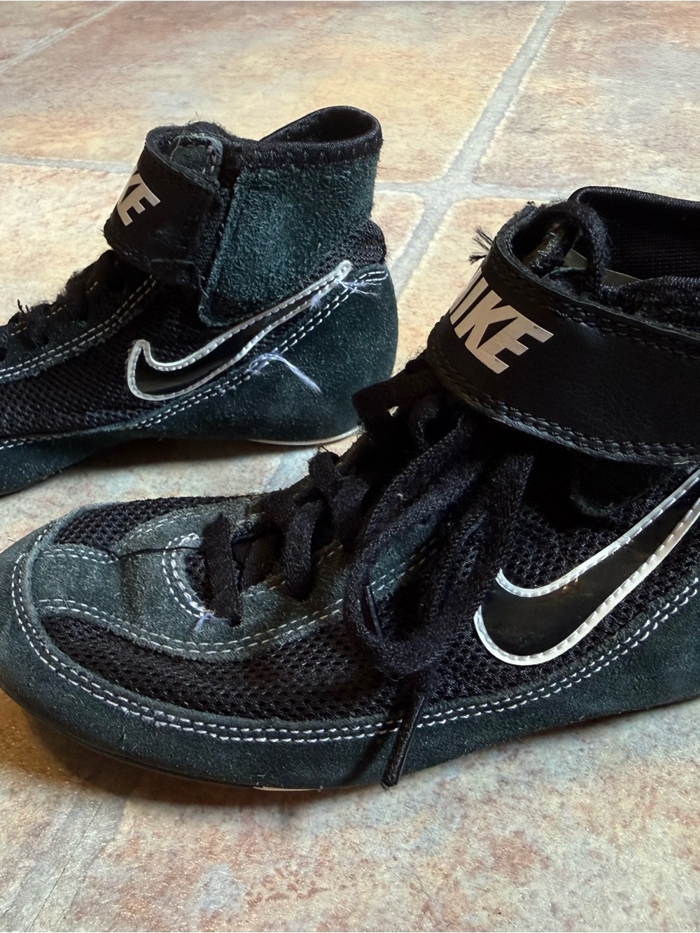 Nike Kids Black High-Top Sneakers with White Swoosh